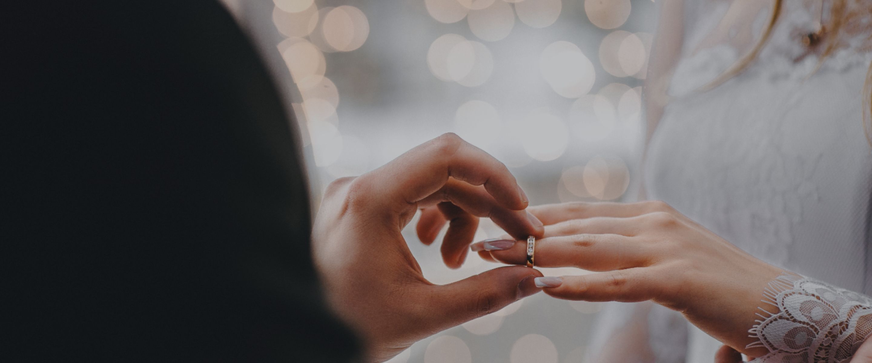 a wedding ring on a female hand